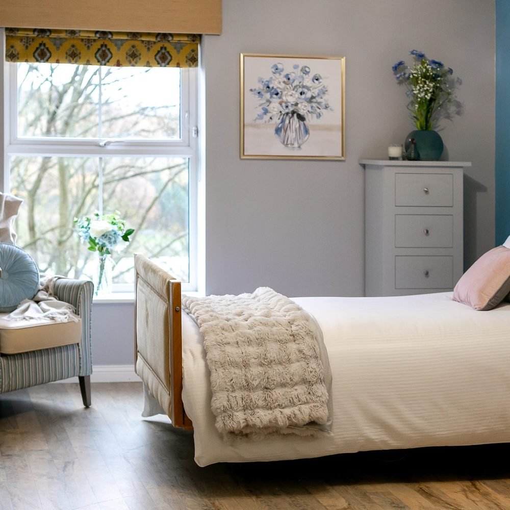 A bright care home bedroom photographed for a client