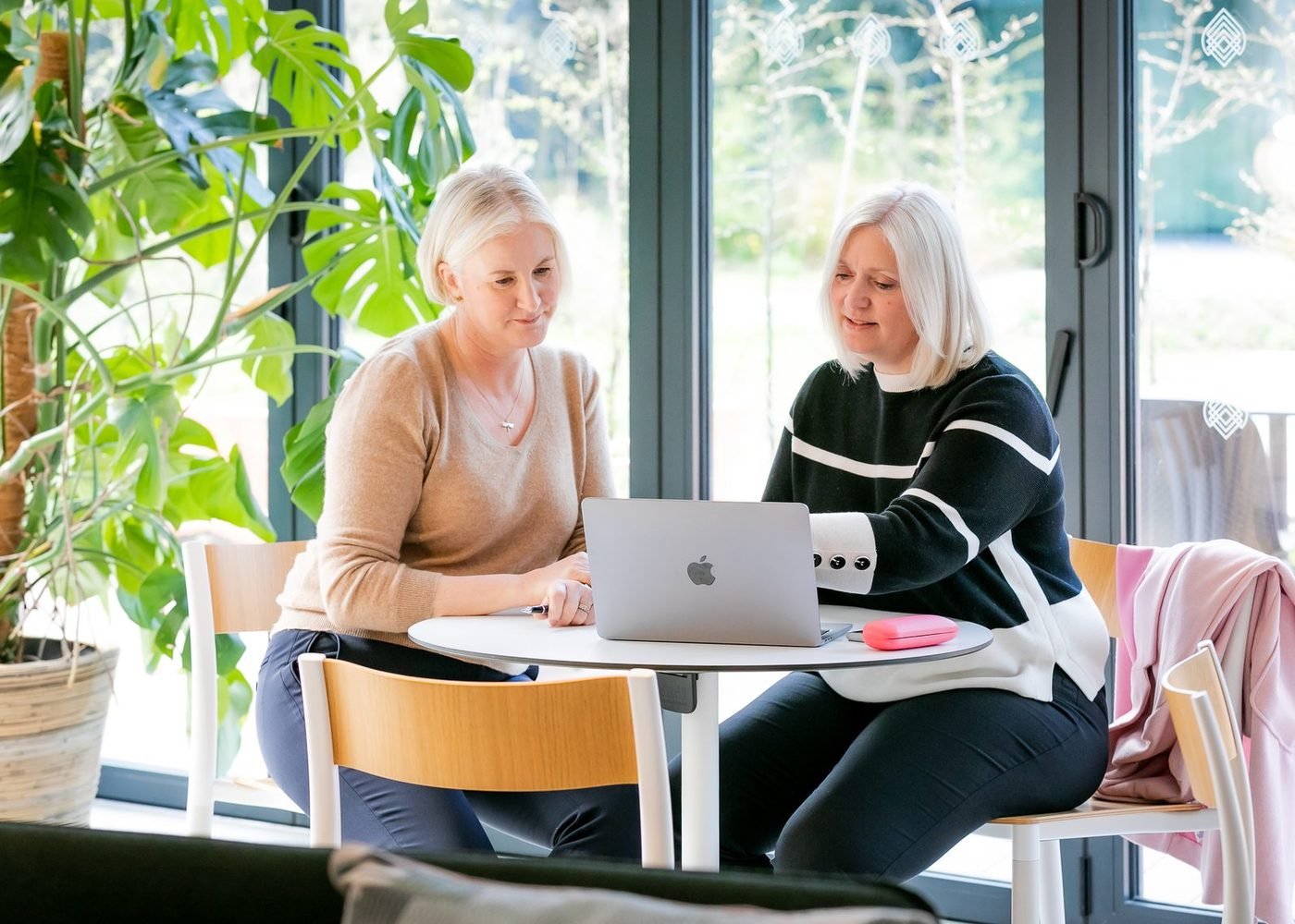 Sally Rasmussen in conversation with a care home client