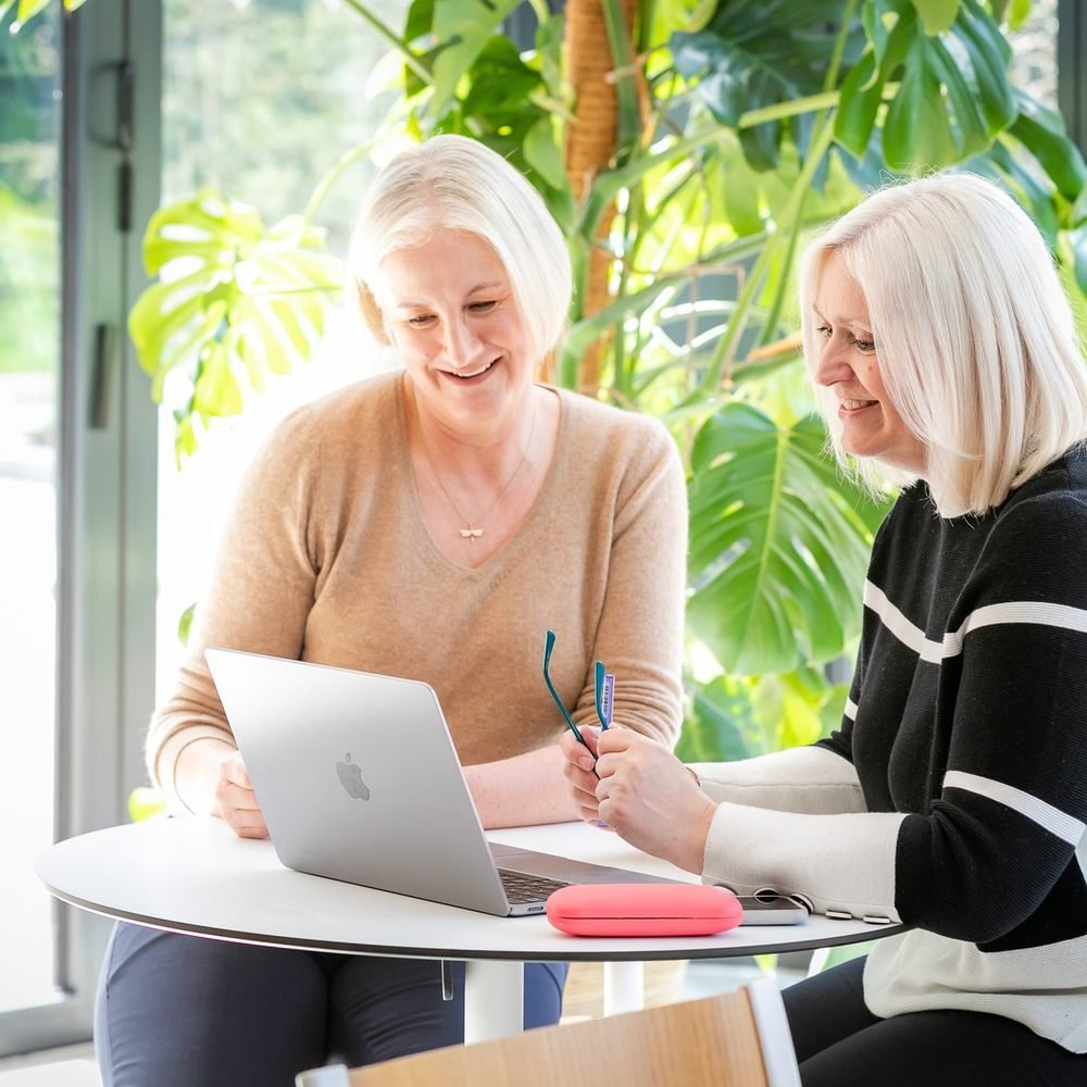 Sally working through a marketing plan with a care home owner